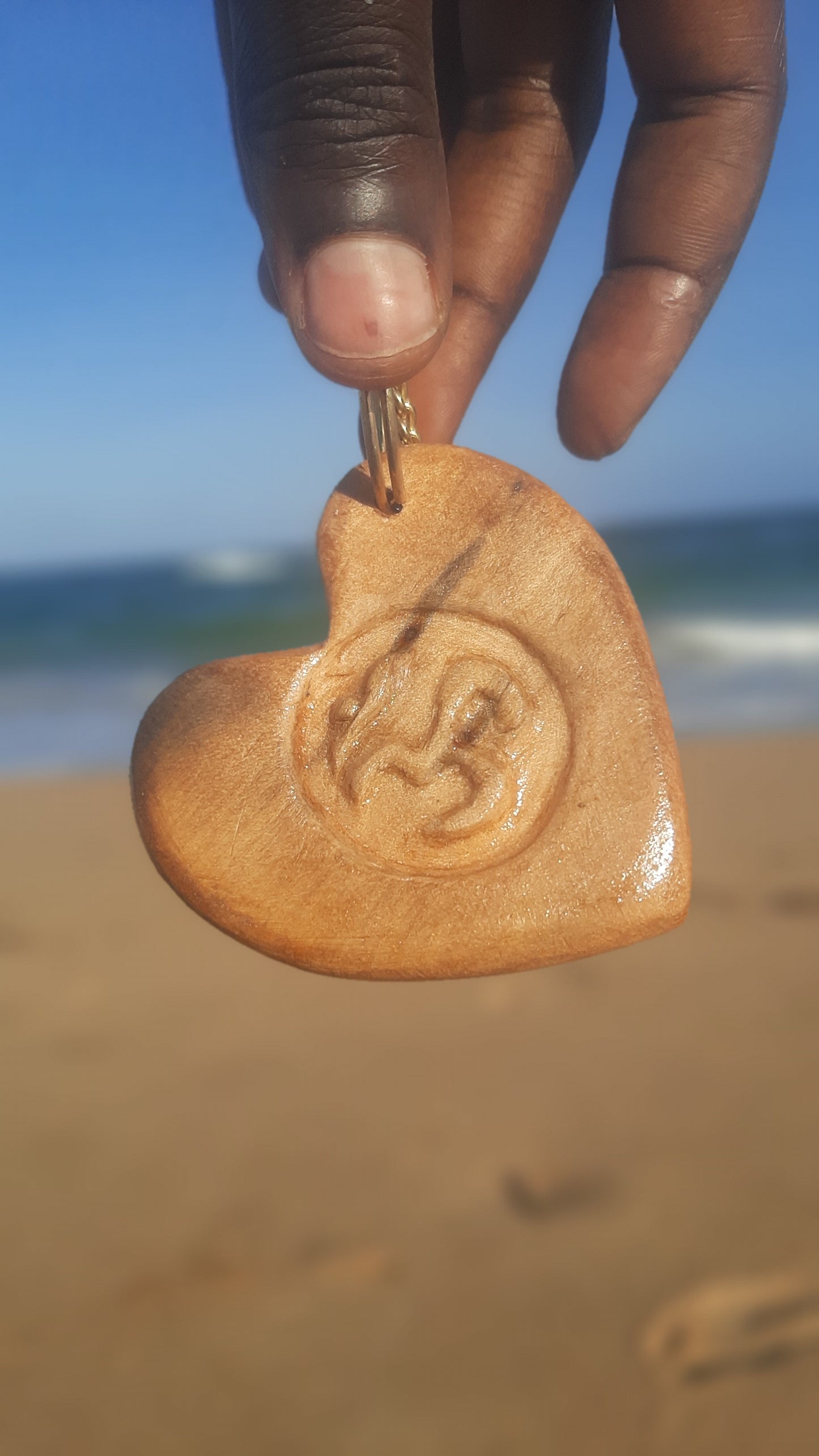 HANDMADE SWAHILI WOODEN PENDANTS & KEYCHAINS